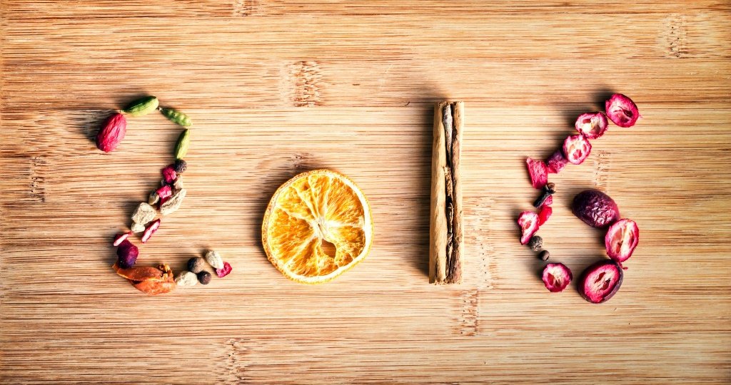 2016 written with spices on wooden background